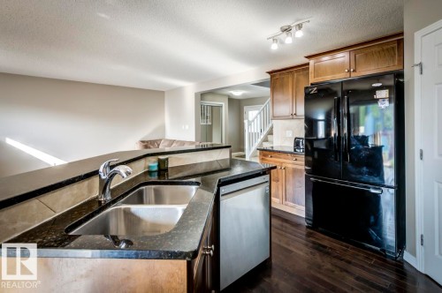 5823 7 Avenue, Edmonton, AB - Indoor Photo Showing Kitchen With Double Sink