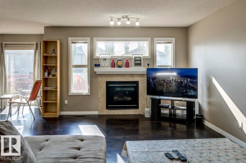 5823 7 Avenue, Edmonton, AB - Indoor Photo Showing Living Room With Fireplace