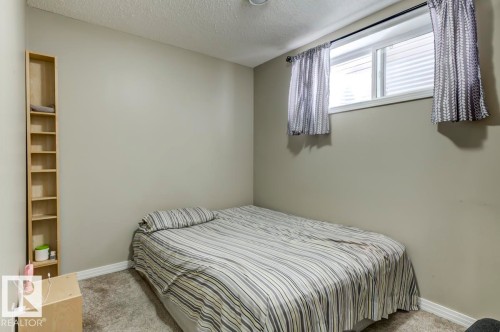 5823 7 Avenue, Edmonton, AB - Indoor Photo Showing Bedroom