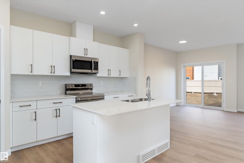 841 Rowan Close, Edmonton, AB - Indoor Photo Showing Kitchen With Double Sink