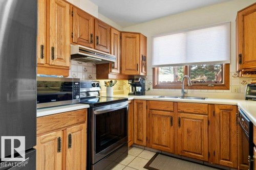 4668 16A Avenue, Edmonton, AB - Indoor Photo Showing Kitchen With Double Sink