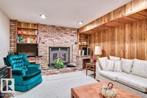 4668 16A Avenue, Edmonton, AB - Indoor Photo Showing Living Room With Fireplace