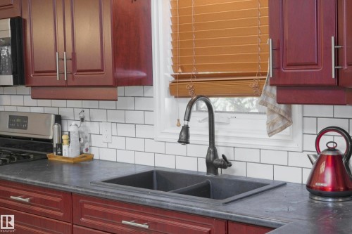 5226 43 Street, Barrhead, AB - Indoor Photo Showing Kitchen With Double Sink