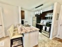 219 5370 Chappelle Road, Edmonton, AB  - Indoor Photo Showing Kitchen With Double Sink 