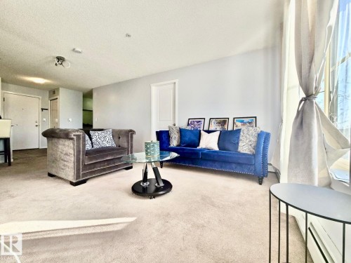 219 5370 Chappelle Road, Edmonton, AB - Indoor Photo Showing Living Room