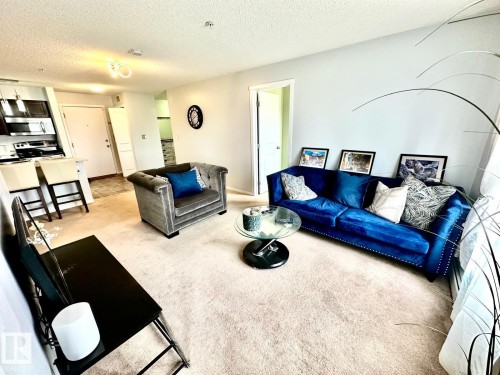 219 5370 Chappelle Road, Edmonton, AB - Indoor Photo Showing Living Room