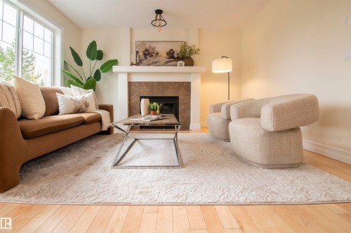 21323 58 Avenue, Edmonton, AB - Indoor Photo Showing Living Room With Fireplace