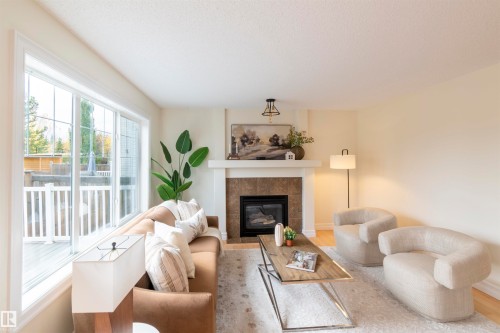 21323 58 Avenue, Edmonton, AB - Indoor Photo Showing Living Room With Fireplace