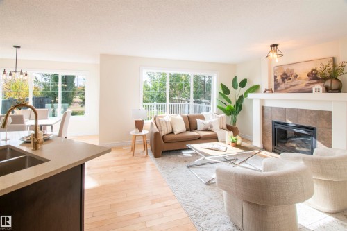 21323 58 Avenue, Edmonton, AB - Indoor Photo Showing Living Room With Fireplace