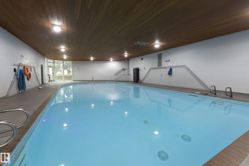 213 5125 Riverbend Road, Edmonton, AB - Indoor Photo Showing Other Room With In Ground Pool