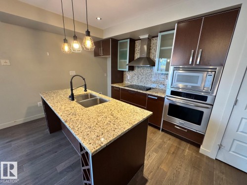 307 10388 105 Street, Edmonton, AB - Indoor Photo Showing Kitchen With Double Sink With Upgraded Kitchen