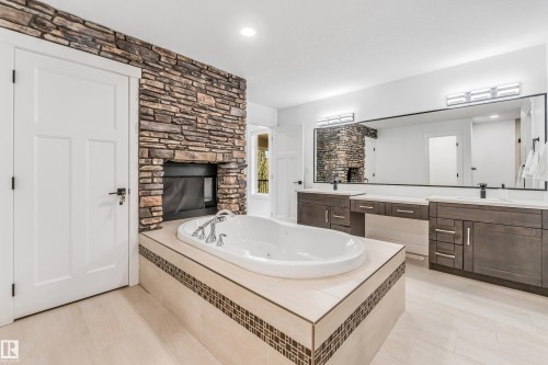 3104 61 Avenue, Rural Leduc County, AB - Indoor Photo Showing Bathroom With Fireplace