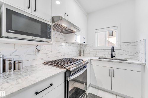 3104 61 Avenue, Rural Leduc County, AB - Indoor Photo Showing Kitchen With Upgraded Kitchen