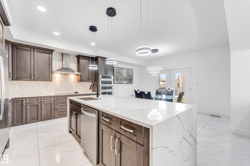 3104 61 Avenue, Rural Leduc County, AB - Indoor Photo Showing Kitchen With Double Sink With Upgraded Kitchen