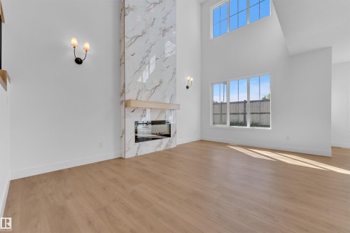 266 Munn Way, Leduc, AB - Indoor Photo Showing Living Room With Fireplace