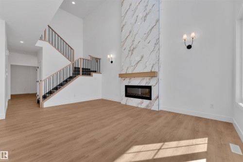 266 Munn Way, Leduc, AB - Indoor Photo Showing Living Room With Fireplace