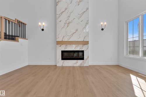 266 Munn Way, Leduc, AB - Indoor Photo Showing Living Room With Fireplace