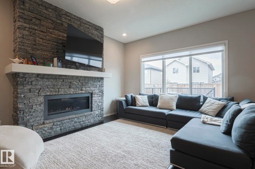 17135 47 Street, Edmonton, AB - Indoor Photo Showing Living Room With Fireplace