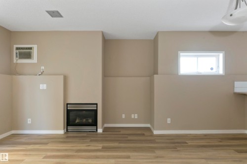 104 10905 109 Street, Edmonton, AB - Indoor With Fireplace