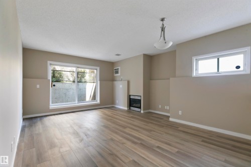 104 10905 109 Street, Edmonton, AB - Indoor With Fireplace