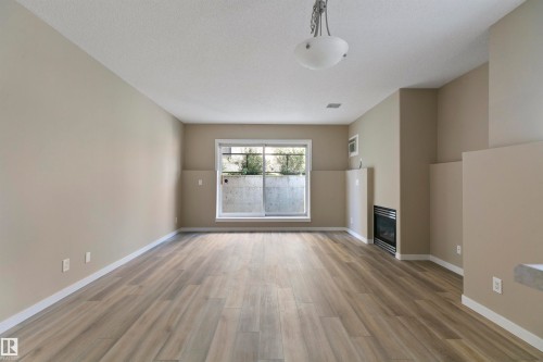 104 10905 109 Street, Edmonton, AB - Indoor With Fireplace