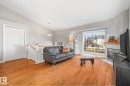 3 303 Leger Way, Edmonton, AB  - Indoor Photo Showing Living Room With Fireplace 