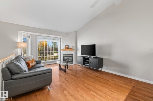3 303 Leger Way, Edmonton, AB - Indoor Photo Showing Living Room With Fireplace