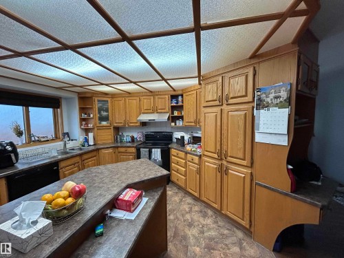 15411 67A Street, Edmonton, AB - Indoor Photo Showing Kitchen With Double Sink