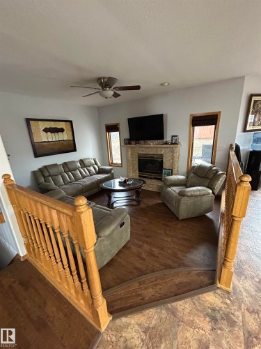 15411 67A Street, Edmonton, AB - Indoor Photo Showing Living Room With Fireplace