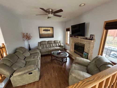 15411 67A Street, Edmonton, AB - Indoor Photo Showing Living Room With Fireplace