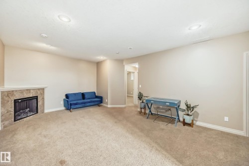 13 12610 15 Avenue, Edmonton, AB - Indoor With Fireplace