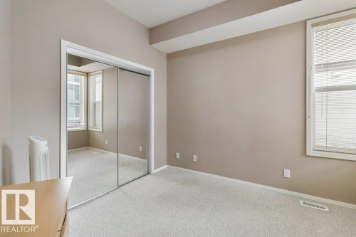 200 4835 104A Street Nw, Edmonton, AB - Indoor Photo Showing Other Room