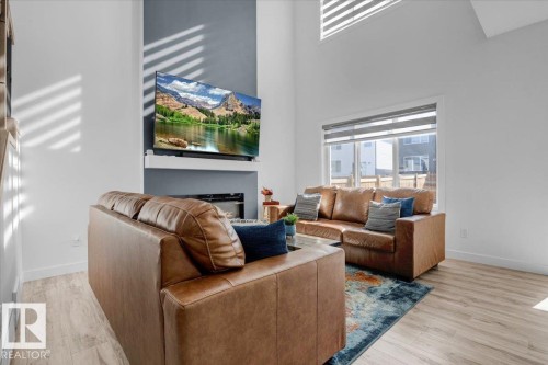 9537 Carson Bend Bend, Edmonton, AB - Indoor Photo Showing Living Room With Fireplace