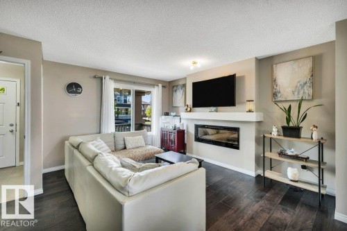 4314 Prowse Link, Edmonton, AB - Indoor Photo Showing Living Room With Fireplace