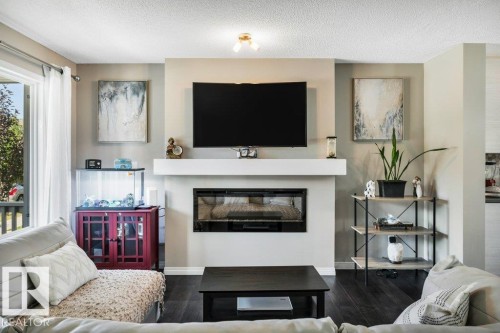 4314 Prowse Link, Edmonton, AB - Indoor Photo Showing Living Room With Fireplace
