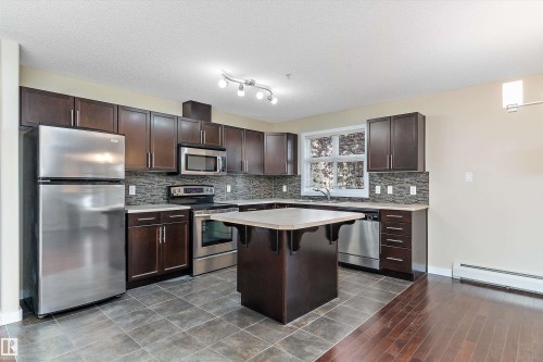 132 11603 Ellerslie Road, Edmonton, AB - Indoor Photo Showing Kitchen With Upgraded Kitchen