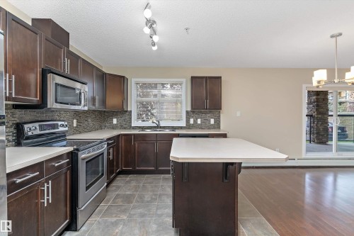 132 11603 Ellerslie Road, Edmonton, AB - Indoor Photo Showing Kitchen With Upgraded Kitchen