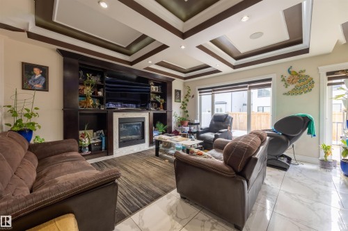 16724 61 Street, Edmonton, AB - Indoor Photo Showing Living Room With Fireplace