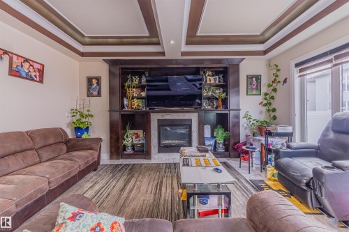 16724 61 Street, Edmonton, AB - Indoor Photo Showing Living Room With Fireplace