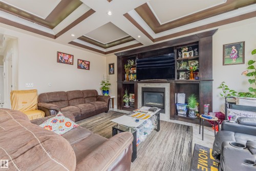 16724 61 Street, Edmonton, AB - Indoor Photo Showing Living Room With Fireplace