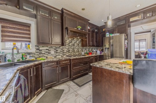 16724 61 Street, Edmonton, AB - Indoor Photo Showing Kitchen With Double Sink With Upgraded Kitchen