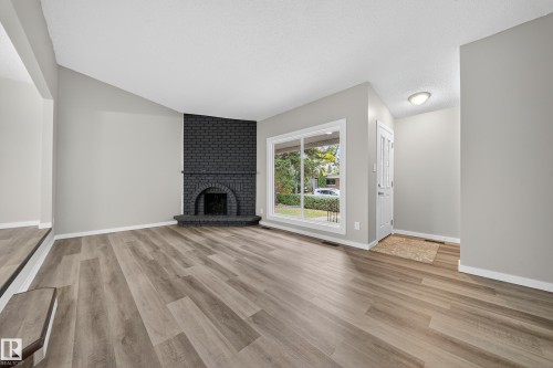 10313 150 Street, Edmonton, AB - Indoor Photo Showing Living Room With Fireplace