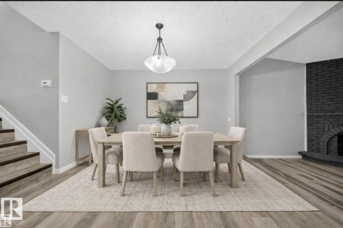 10313 150 Street, Edmonton, AB - Indoor Photo Showing Dining Room With Fireplace