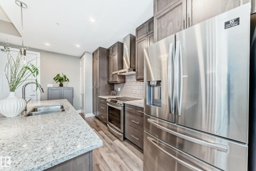 421 524 Griesbach Parade, Edmonton, AB - Indoor Photo Showing Kitchen With Double Sink With Upgraded Kitchen