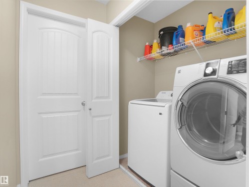 65 Ashby Gardens, Spruce Grove, AB - Indoor Photo Showing Laundry Room