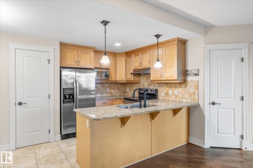 507 10142 111 Street, Edmonton, AB - Indoor Photo Showing Kitchen With Double Sink
