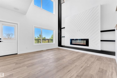 638 Astoria Way, Devon, AB - Indoor Photo Showing Living Room With Fireplace
