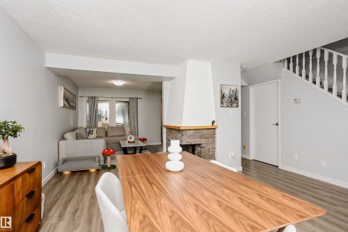 56 2020 105 Street, Edmonton, AB - Indoor Photo Showing Living Room With Fireplace