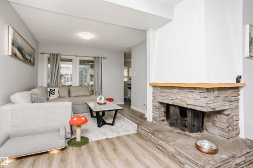 56 2020 105 Street, Edmonton, AB - Indoor Photo Showing Living Room With Fireplace