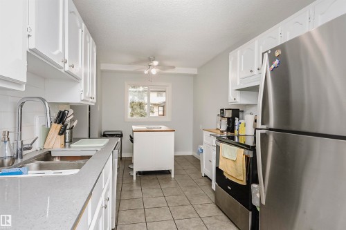 56 2020 105 Street, Edmonton, AB - Indoor Photo Showing Kitchen With Double Sink